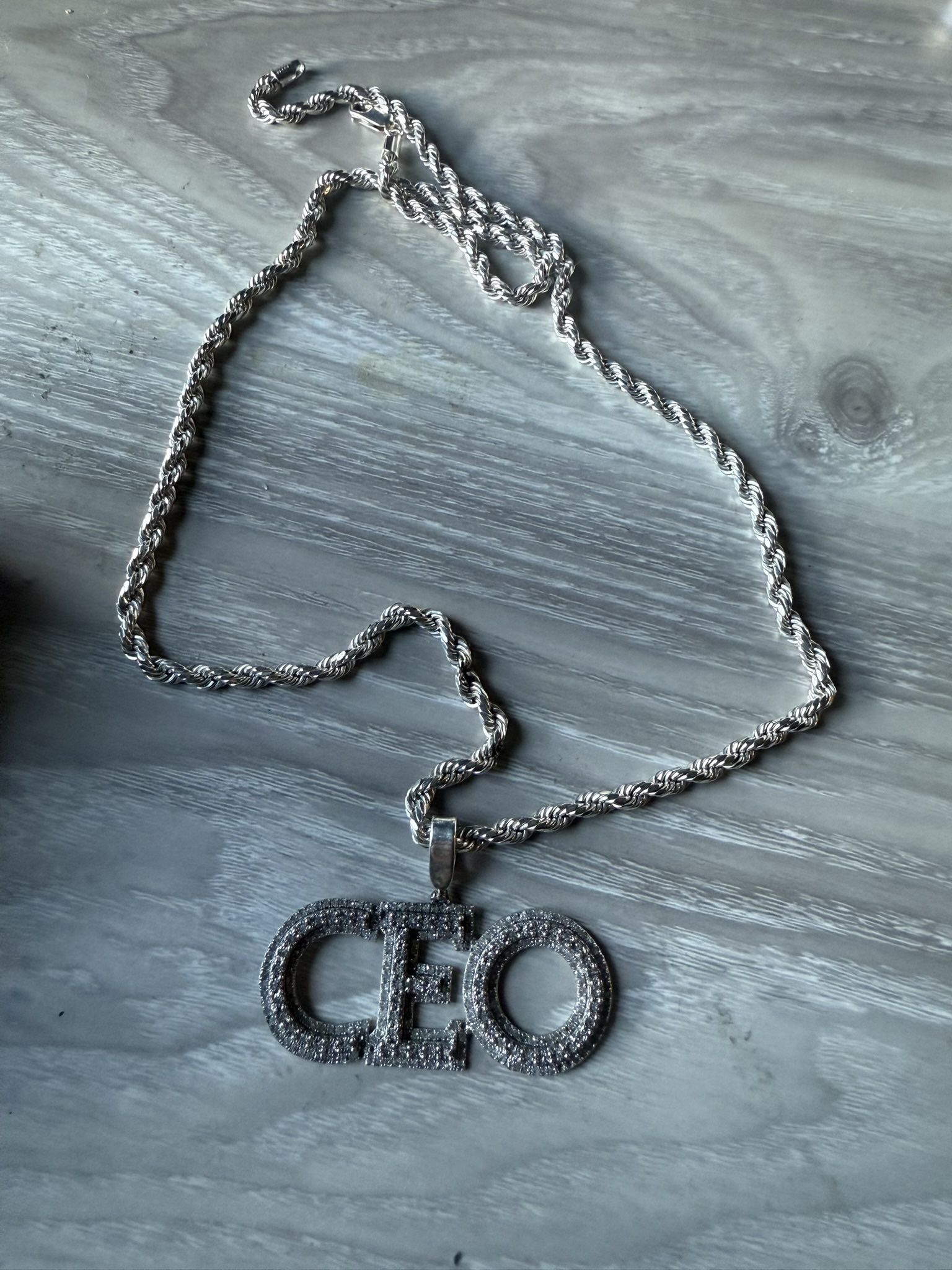 Silver necklace with .50 carat diamond CEO charm from MJ Diamond.