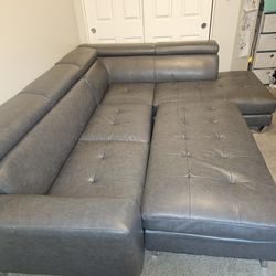 Leather sectional & Ottoman like new !