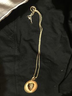 Gold chain with gold pendant
