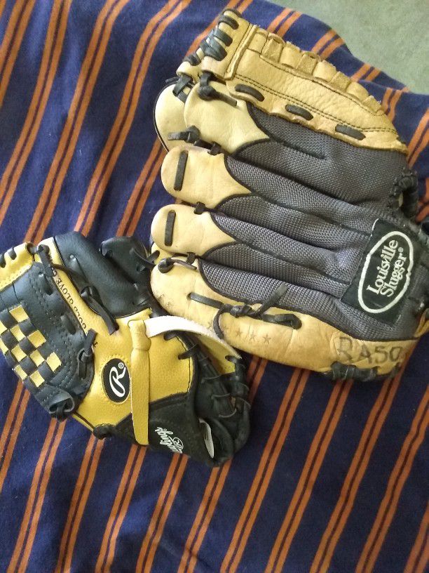 Couple Baseball Gloves