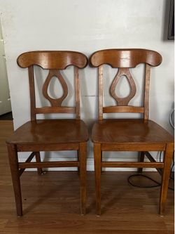 Set of 4. Wood Dining chairs .