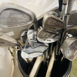 Assorted golf Clubs And 2 Bags 