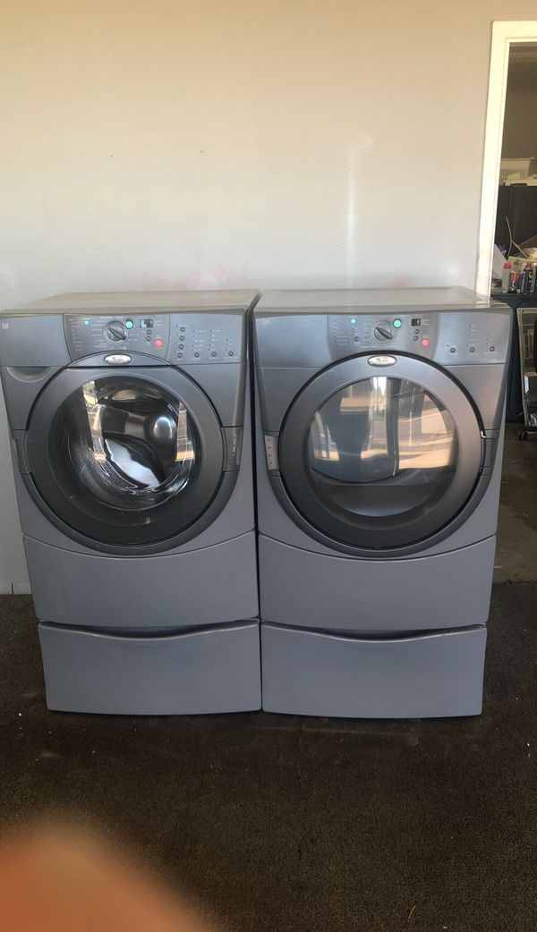 Whirlpool duet super capacity front load washer and dryer on pedestals