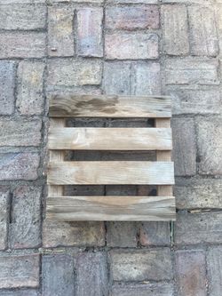 Wooden rolling plant stand $5