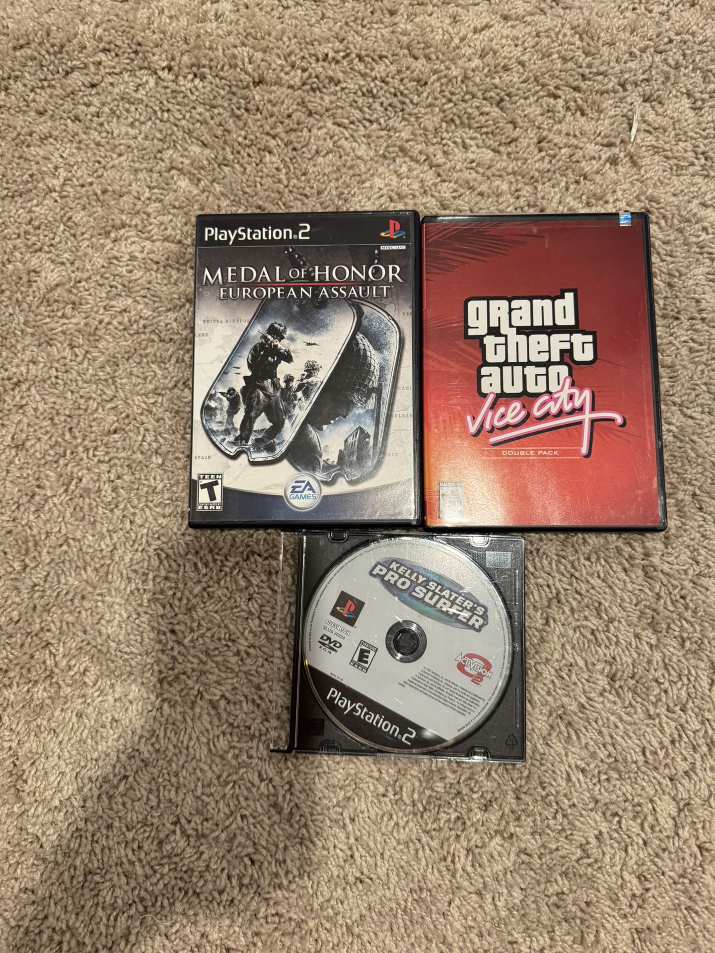 3 Mixed 🎮 PlayStation 2 (PS2) Game Lot – GTA, Medal of Honor & Kelly Slater’s Pro Surfer