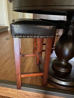 dark wood, pleather brass studded barstools