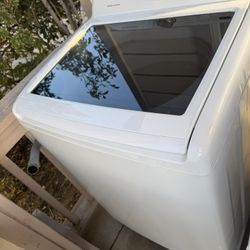 The washer and dryer are like new.