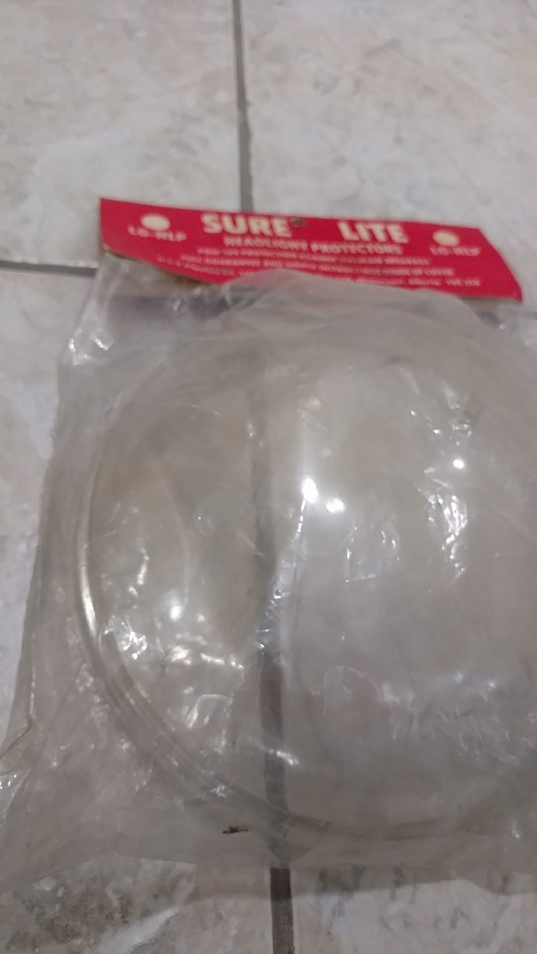 Sure-lite headlight protector.