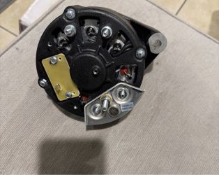 Black Automotive Alternator with Mounting Bracket
