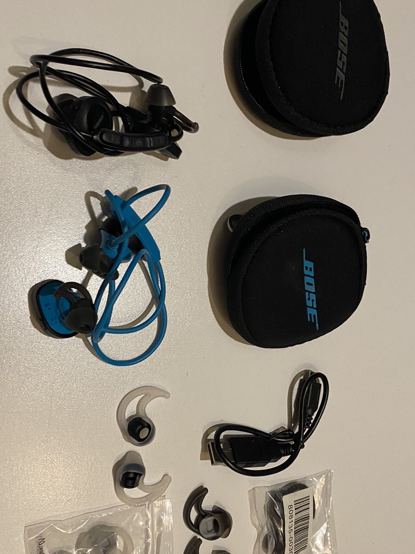 2 Pairs Of Bose Soundsport Bluetooth Earbuds