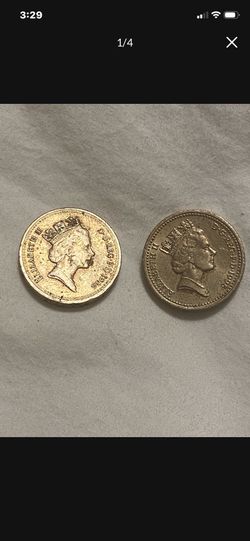 1986 And 1995 British One Pound coin featuring the Latin phrase "DECUS ET TUTAMEN"