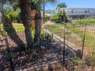3 Large dog exercise pans used as fencing