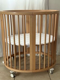 Brown stokke crib