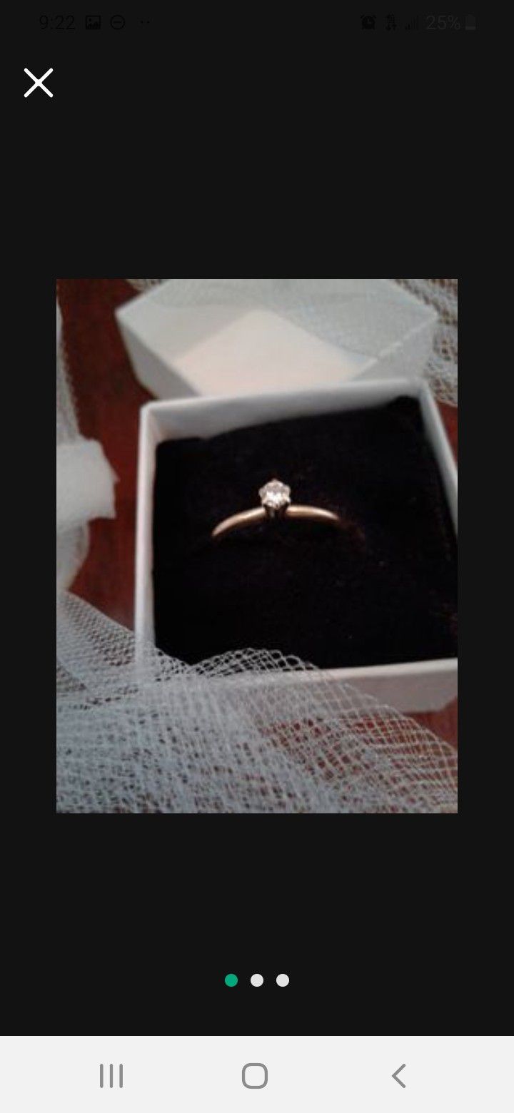 Solid Gold Engagement ring, size 4.5, higher quality diamond!