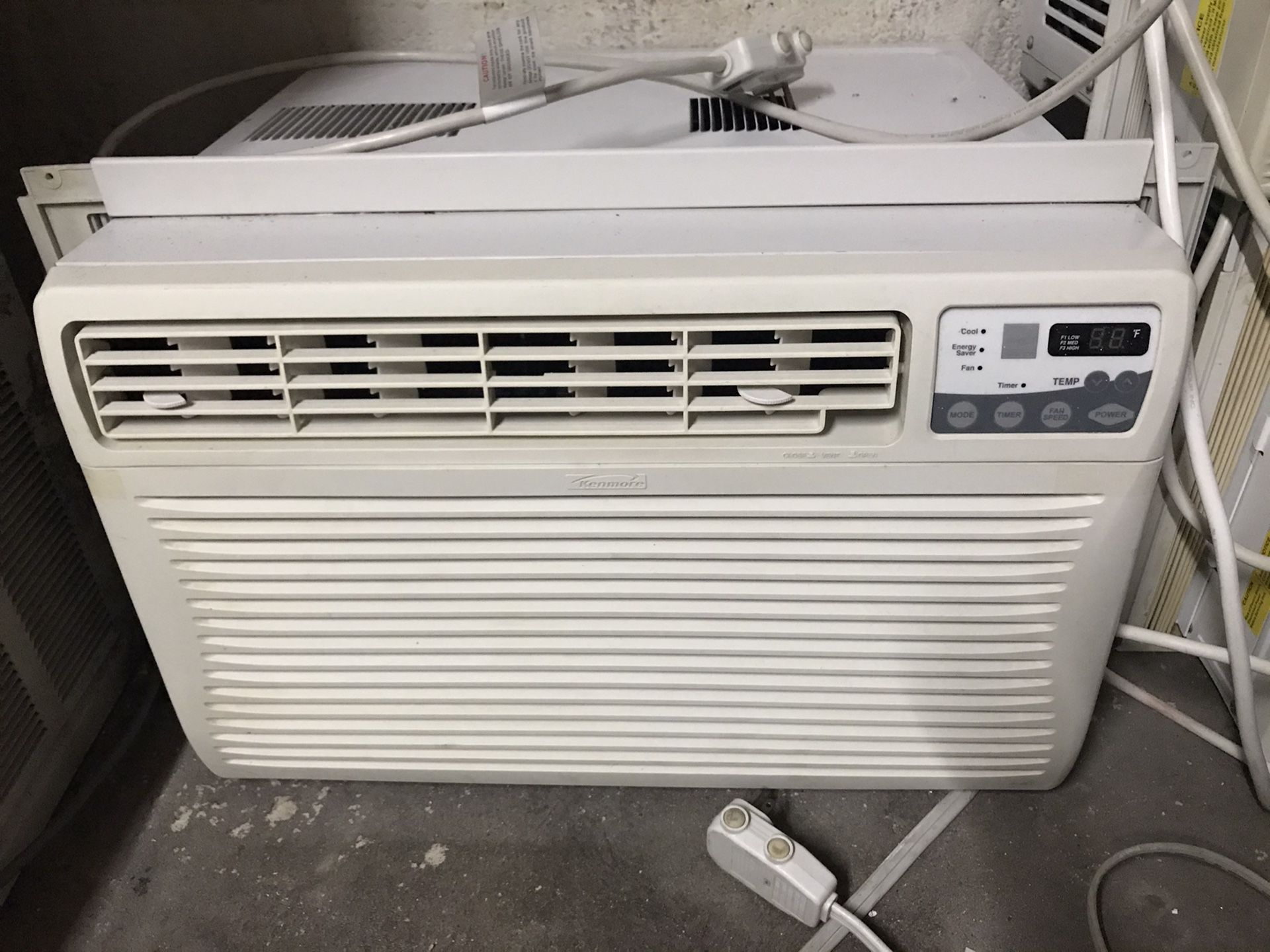 Kenmore 12000btu air conditioner with side sleeves