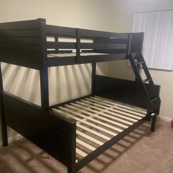 Twin/full bunk bed. $350 bunk only. $550 with mattresses. Assembly required. Assembly not included. Tax included. Free local delivery.