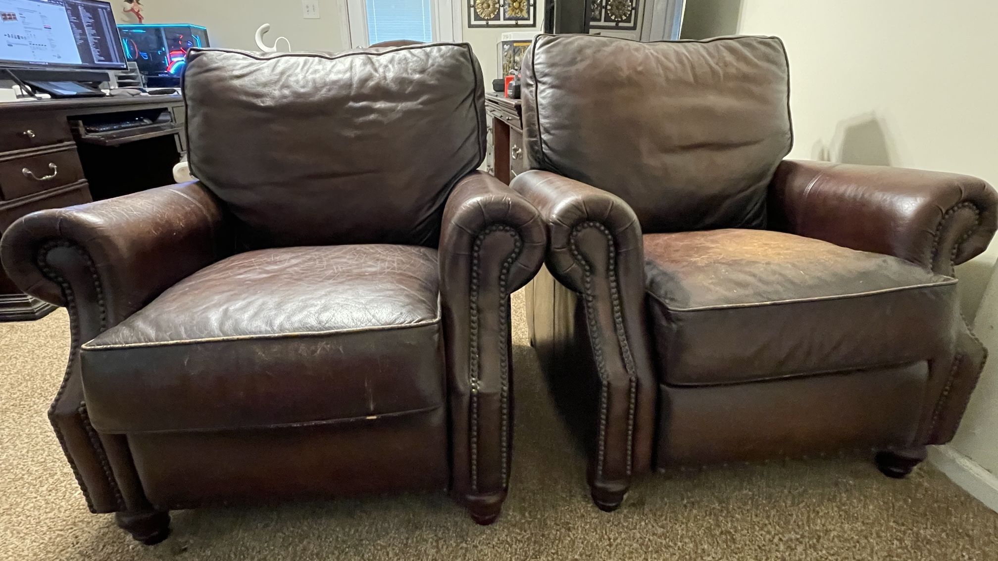 Two Rechining Leather Sofa Chairs