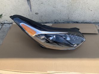 (contact info removed)9 Kia Sportage headlight