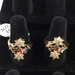 RINGS WITH COLOR STONE  14 K LAMINATED  GOLD PLATED SIZE 10