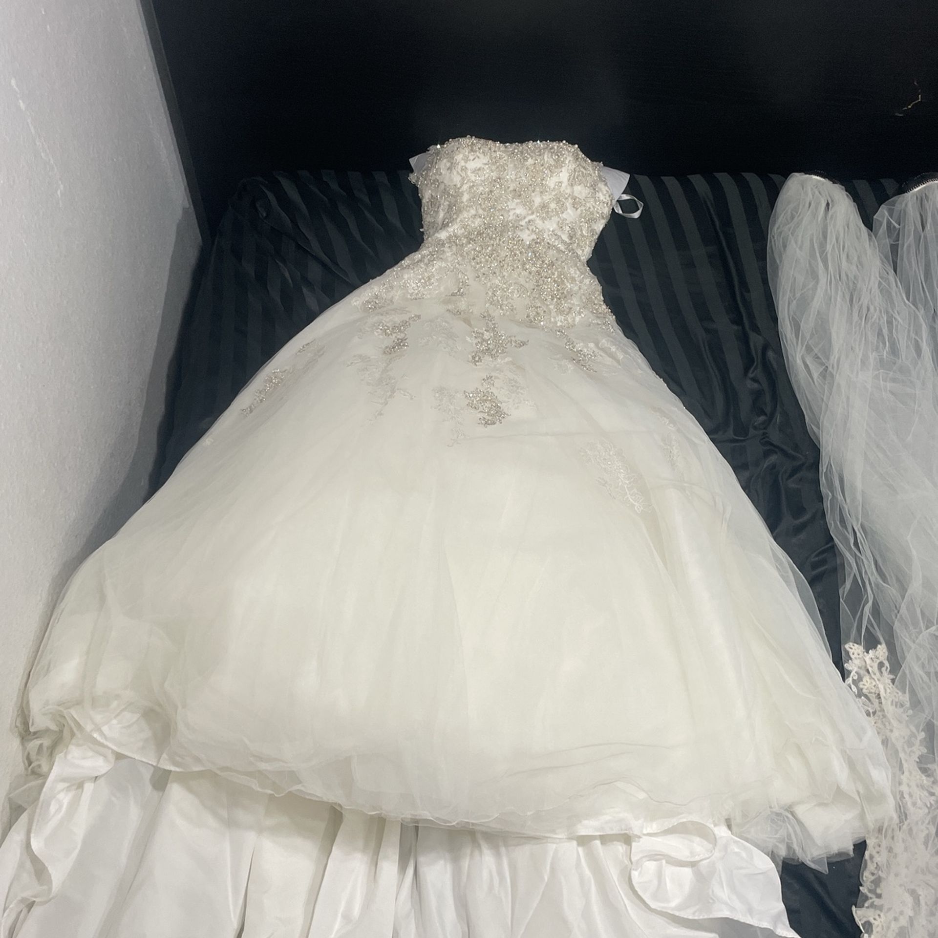 White Wedding Dress. Wedding Crown Preservation Co
