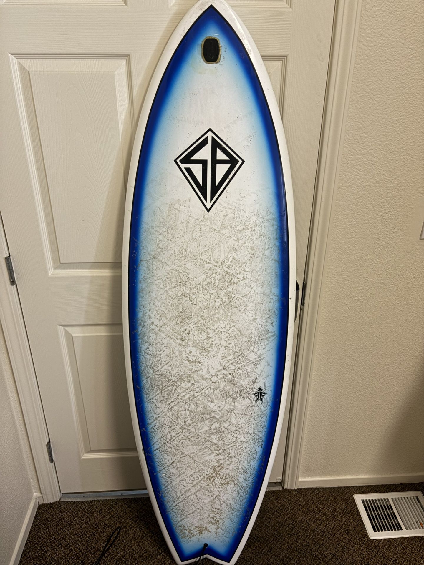 5'10" × 20 1/2" × 2 3/4" 35.5 liters Scott Burke Flying Fish