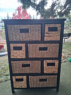 Dresser with wicker baskets