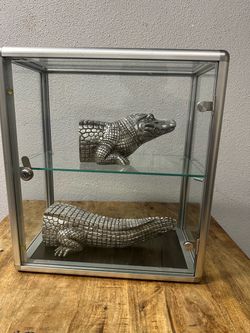 Alligator decord pieces, in glass encasement, $80 OBO