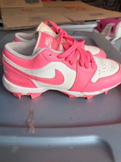 Pink Nike baseball cleats