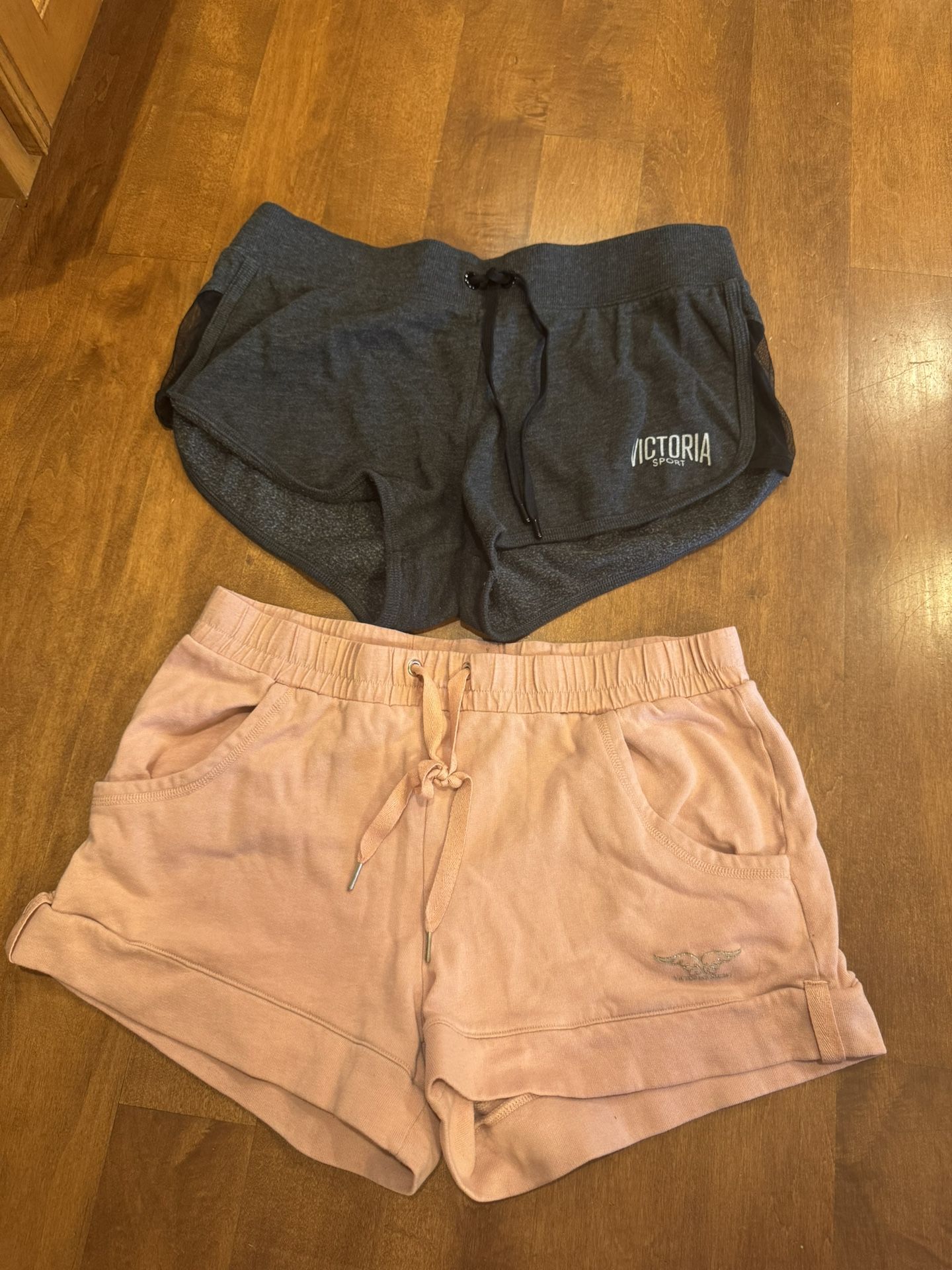 Woman’s Victoria’s Secret supermodel essentials in Victoria’s Secret sport shorts bundle shipping available