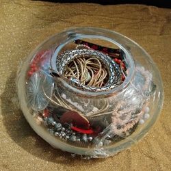 Vase filled with jewelry