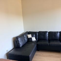 Sleek Black Leather Sectional Couch
