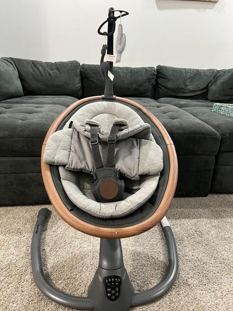 Maxi cosí swing with new born insert