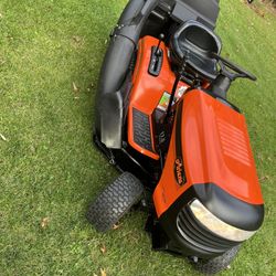 Riding Lawnmower With Dual Bagger Attachment 