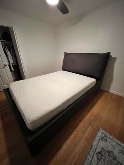 Queen Upholstery Bed / As New
