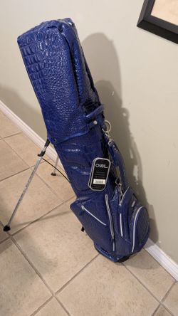 BRAND NEW OUUL GOLF STAND BAG IS PREMIUM DESIGN 5-WAY TOP 6 ZIPPERS POCKETS SINGLE STRAPS SEMI CONCEALED STAND BAG is A STYLISH NAVY BLUE COLOR