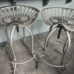Two Tractor stools 