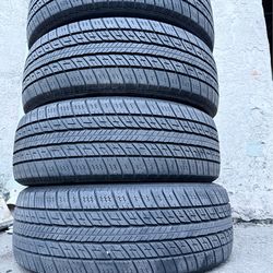 4 used 225/60/18 UNIROYAL TIGER PAW TOURING TIRES