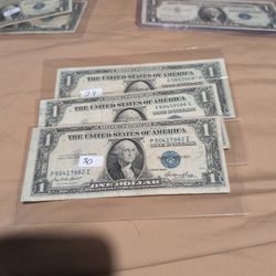 3- 1935 E Series $1 Silver Certs.- ($35)