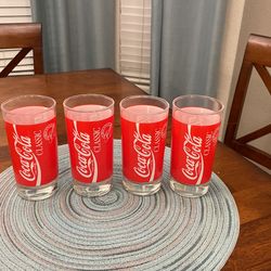 Red and white Coca-Cola drinking glasses