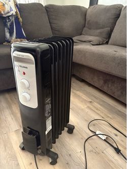 Space heater/ radiator heater oil filled on wheels