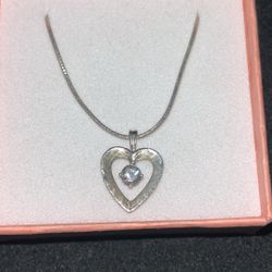 14k gold 16” chain  and charm with diamond 4.2 grams