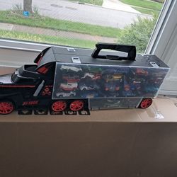 Hot wheel car and toll truck.