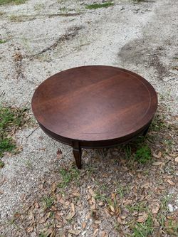 Solid wood round coffee table. 42 x 18