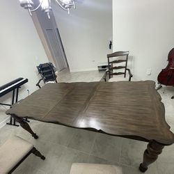 BROWN WOODEN DINING TABLE $200 - OBO - PICK UP ONLY IN LAKE NONA, FL