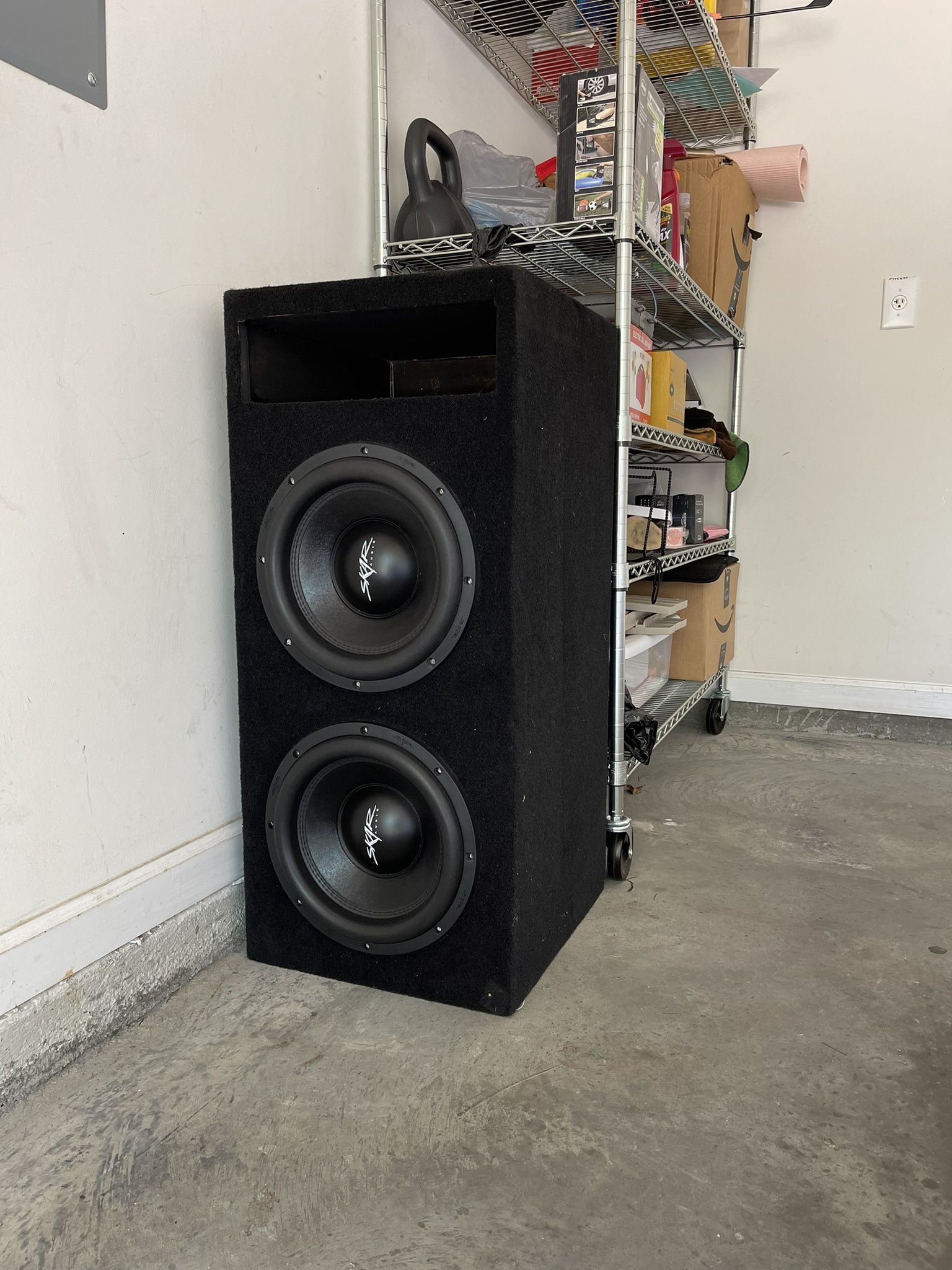 Two 12” Skarr’s and a 2,000 watts Brutus Hifonics amp