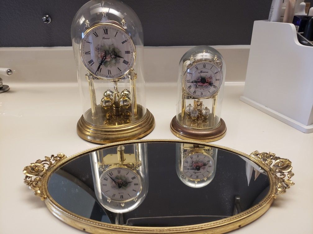 Gold clocks and vanity mirror tray