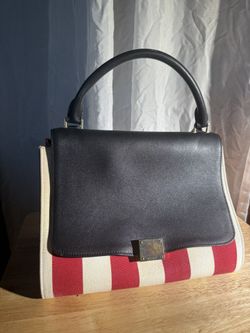 Red And White Stripe “ENILEC”