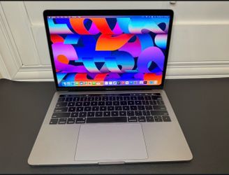MacBook Pro 2019 8GB  with Touch Bar screen (excellent condition)
