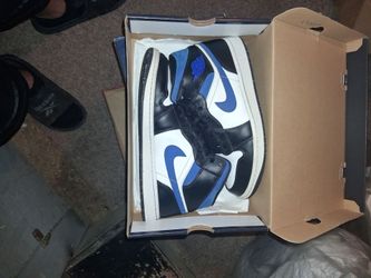 Blue, black, and white Jordan's size 11