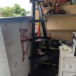 Corner stand shelving unit